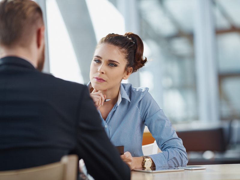 Woman interviewing a man