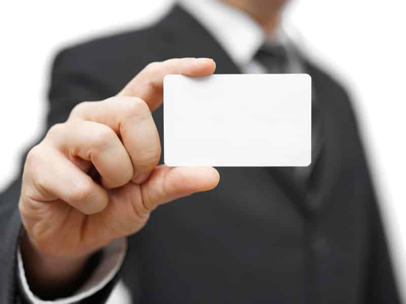 Business man showing business card