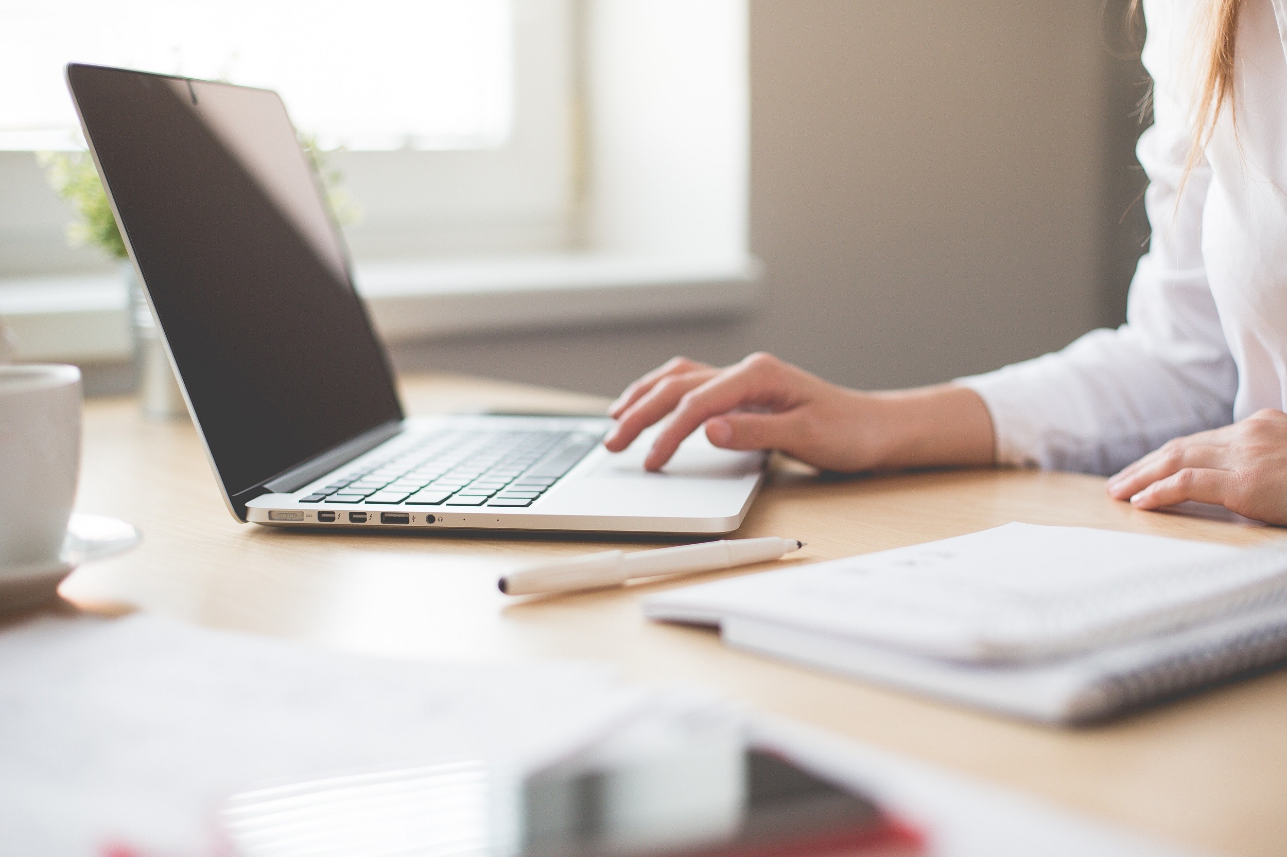 A woman working at a computer