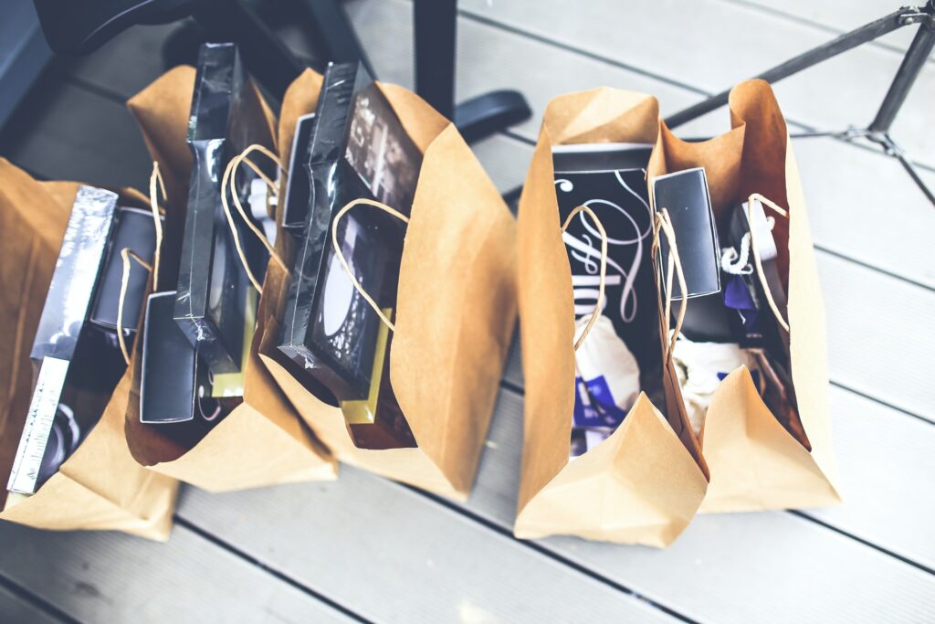 Shopping bags full of products 
Photo by Kaboompics .com