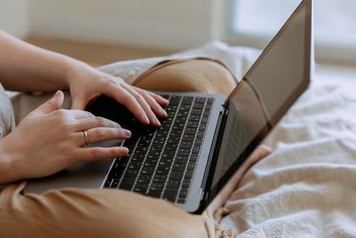 Woman on her computer looking at emails