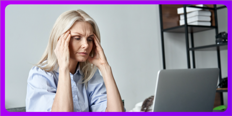 stressed woman in front of a computer