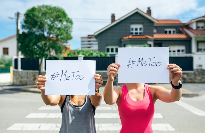 women-showing-poster-with-metoo-hashtag