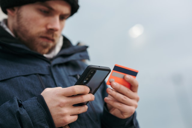 Man trying to buy something online from his smartphone