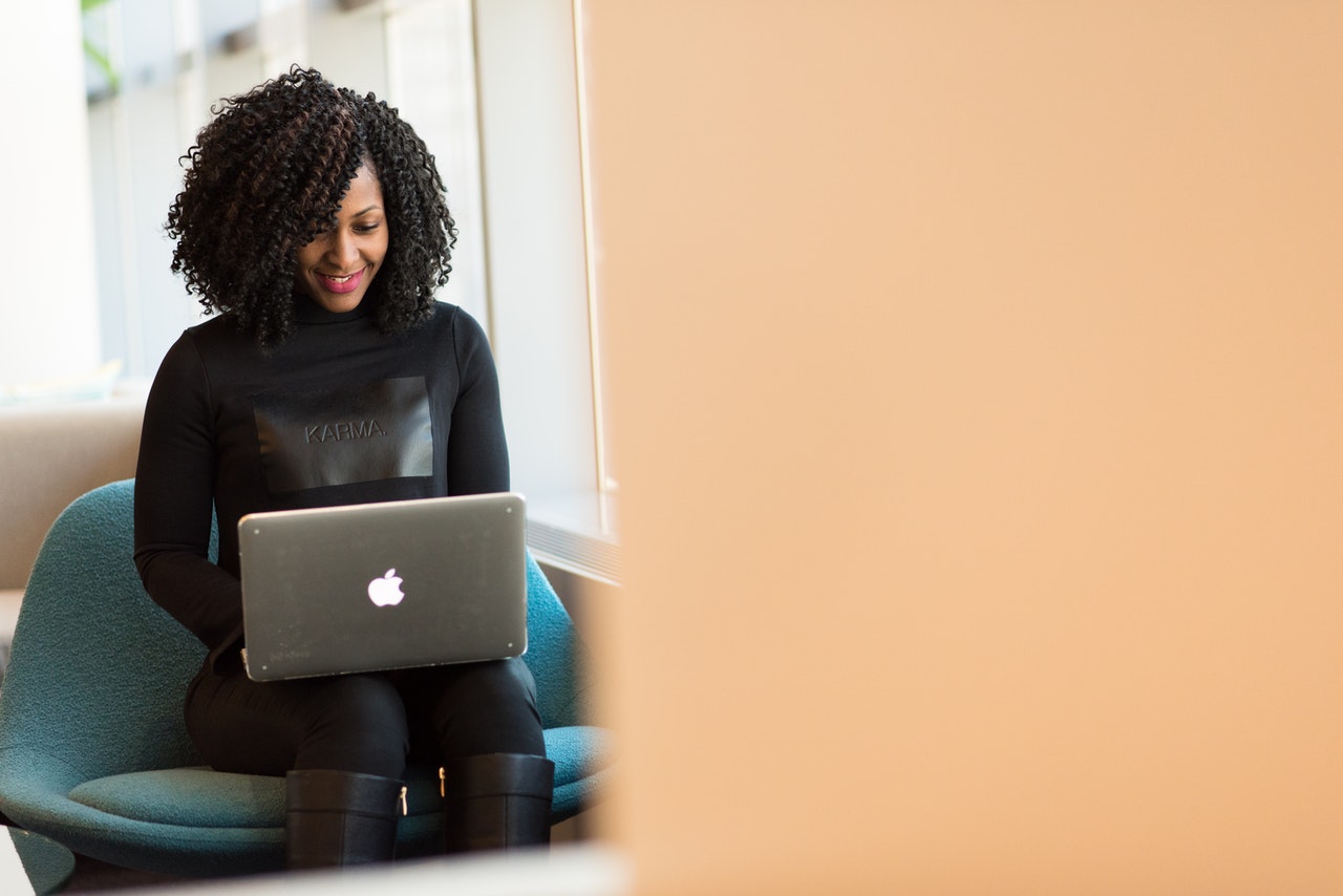 Woman forming an LLC on her laptop