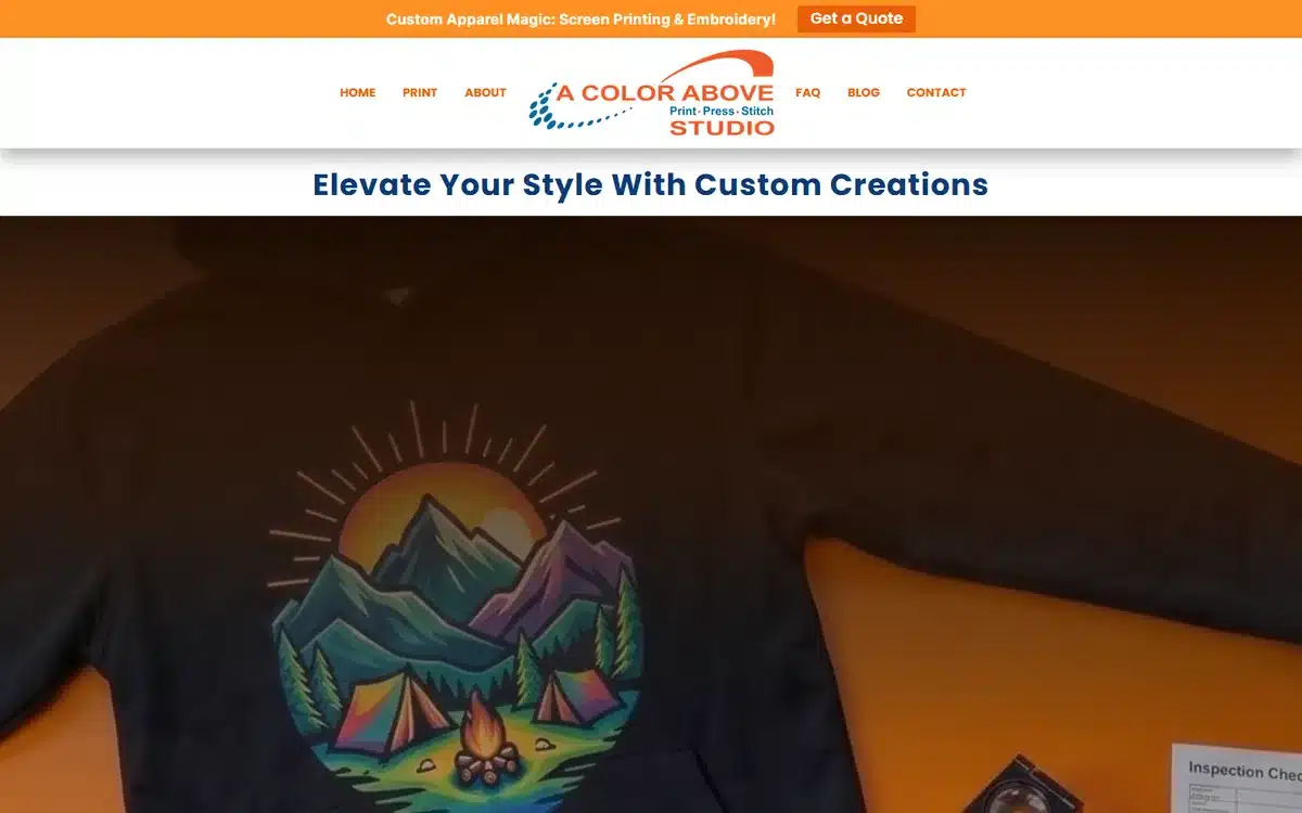 A Color Above custom apparel website with a vivid printed-hoodie product hero