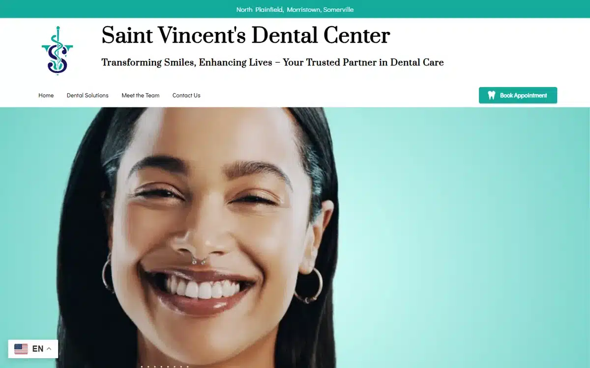Saint Vincent's Dental Center website with vibrant teal background and striking smile portrait