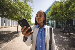 A small business owner staying connected on T-Mobile's network with CoreMobile.