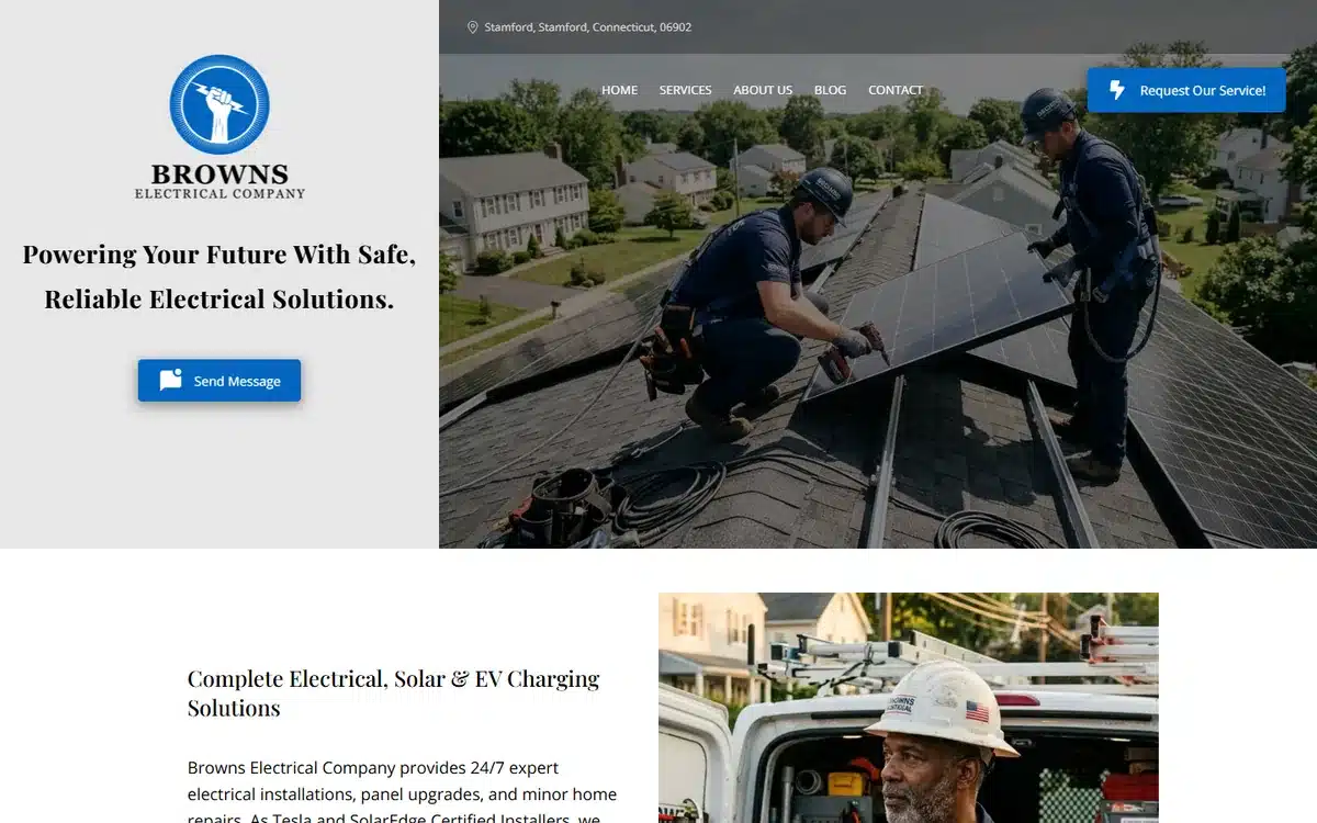 Browns Electrical Company website homepage showing their own crew mounting solar panels on a roof