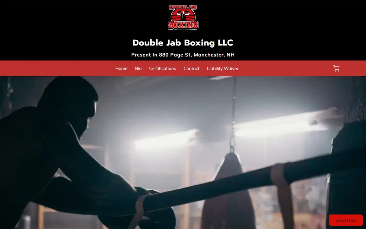 The Double Jab Boxing website homepage with business name and street address stacked above the navigation